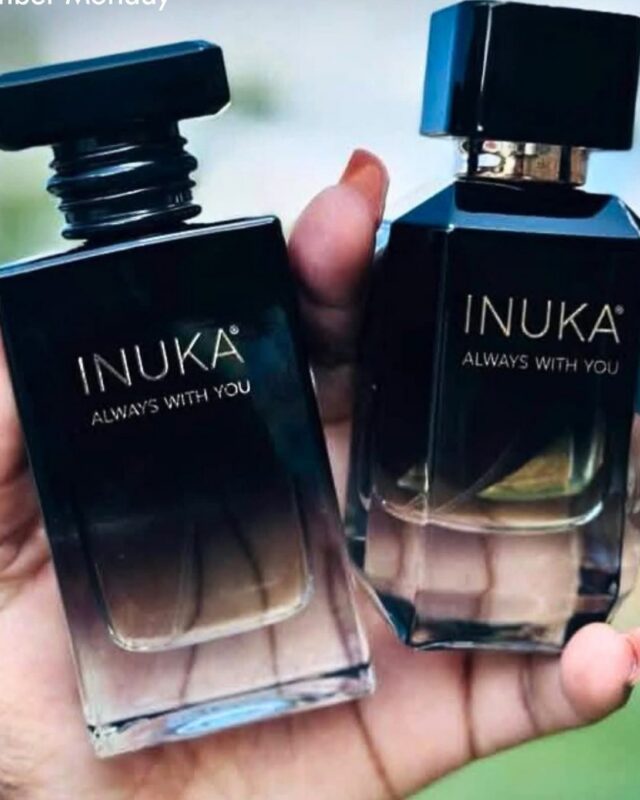 INUKA Signature perfumes in hand