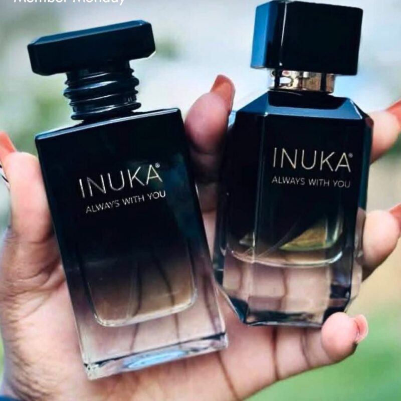 INUKA Signature perfumes in hand